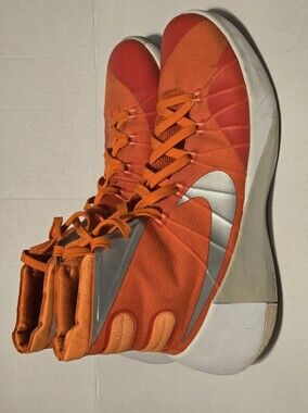 Nike High-Top Basketball Sneakers in Bright Orange with Silver Swoosh
